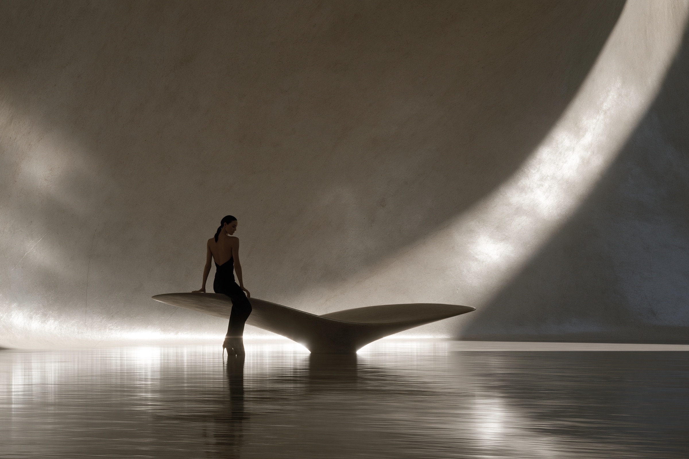 A woman seated on a curved stone form above still water, in a concrete hall